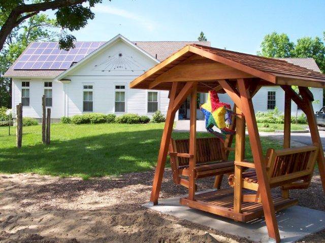St. Anthony's Face to Face Gliders (XW Size, Redwood, No Kid's Platform, XW Roof, No Engraving, Transparent Premium Sealant). St. Anthony's Face to Face Gliders (XW Size, Redwood, No Kid's Platform, XW Roof, No Engraving, Transparent Premium Sealant).