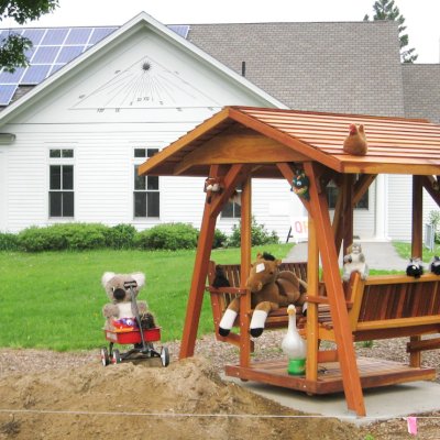St. Anthony's Face to Face Gliders (XW Size, California Redwood, No Kid's Platform, XW Roof, No Engraving, Transparent Premium Sealant).