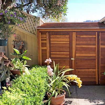 Storage Sheds (Options: 7' W, 4.5' D, 7' H, Redwood, Double Doors, No Shelving, With Deck, Transparent Premium Sealant). Photo Courtesy of I. Speiser of Carmel, CA