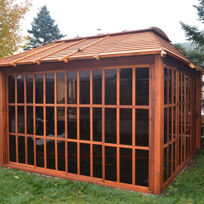 Sun Gazebo with Sliding Doors (Options: 12' L, 12' W, Mature Redwood, 4' x 8' Skylight, No Flooring, Transparent Premium Sealant). Photo Courtesy of Stephane Jean of Chicoutimi, Quebec. Sun Gazebo with Sliding Doors (Options: 12' L, 12' W, Mature Redwood, 4' x 8' Skylight, No Flooring, Transparent Premium Sealant). Photo Courtesy of Stephane Jean of Chicoutimi, Quebec.