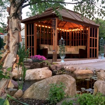 Sun Gazebo with Sliding Doors (Options: 14' L, 10' W, California Redwood, 4' x 6' Skylight, No Flooring, Transparent Premium Sealant). Photo Courtesy of Doug, Carrie & Zoe Jones of N. Caldwell, NJ. 