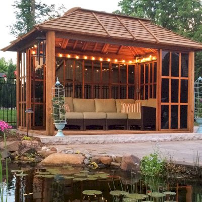 Sun Gazebo with Sliding Doors (Options: 14' L, 10' W, California Redwood, 4' x 6' Skylight, No Flooring, Transparent Premium Sealant). Photo Courtesy of Doug, Carrie & Zoe Jones of N. Caldwell, NJ. 