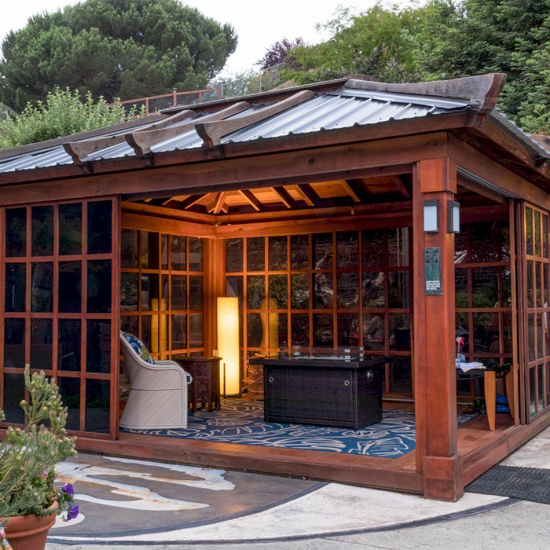 Sun Gazebo with Sliding Doors (Options: 14' L, 12' W, California Redwood, 4' x 6' Skylight, Complete Floor, Transparent Premium Sealant). Metal roof added by custom request. The roof timbers were not resealed and are 4 years old while the rest of the structure was resealed recently. Photo Courtesy of A. Ramon of South San Francisco, CA. Note: Metal Roof provided by Home Depot: 12ft. Classic Rib Steel Roof Panel in Charcoal, Model #2313417, Internet #204255071 Sun Gazebo with Sliding Doors (Options: 14' L, 12' W, California Redwood, 4' x 6' Skylight, Complete Floor, Transparent Premium Sealant). Metal roof added by custom request. The roof timbers were not resealed and are 4 years old while the rest of the structure was resealed recently. Photo Courtesy of A. Ramon of South San Francisco, CA. Note: Metal Roof provided by Home Depot: 12ft. Classic Rib Steel Roof Panel in Charcoal, Model #2313417, Internet #204255071