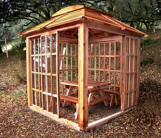 Sun Gazebo with Sliding Doors (Options: 8' L, 8' W, California Redwood, 4' x 4' Skylight, No Flooring, Unfinished). Also Shown Inside the Gazebo is a 4.5' Forever Picnic Table with Unattached Benches. Sun Gazebo with Sliding Doors (Options: 8' L, 8' W, California Redwood, 4' x 4' Skylight, No Flooring, Unfinished). Also Shown Inside the Gazebo is a 4.5' Forever Picnic Table with Unattached Benches.