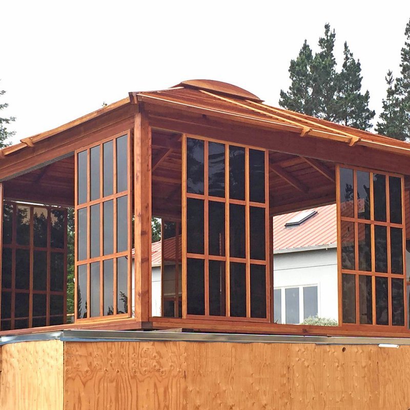 Sun Gazebo with Sliding Doors (Options: 16' L, 16' W, California Redwood, 4' x 4' Skylight, No Flooring, Transparent Premium Sealant). Photo shows only 8 doors/panels, the rest were installed after the photo was taken. Photo Courtesy of L. Moresco of San Francisco, CA. Sun Gazebo with Sliding Doors (Options: 16' L, 16' W, California Redwood, 4' x 4' Skylight, No Flooring, Transparent Premium Sealant). Photo shows only 8 doors/panels, the rest were installed after the photo was taken. Photo Courtesy of L. Moresco of San Francisco, CA.