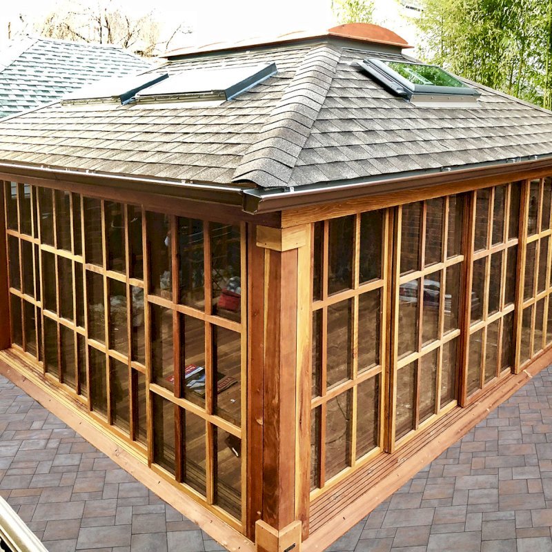 Sun Gazebo with Sliding Doors (Options: 16' L, 16' W, California Redwood, 4' x 8' Skylight, Complete Floor, Transparent Premium Sealant). Skylights and asphalt shingles by custom request. Photo Courtesy of S. Alishaev of New York, NY. Sun Gazebo with Sliding Doors (Options: 16' L, 16' W, California Redwood, 4' x 8' Skylight, Complete Floor, Transparent Premium Sealant). Skylights and asphalt shingles by custom request. Photo Courtesy of S. Alishaev of New York, NY.