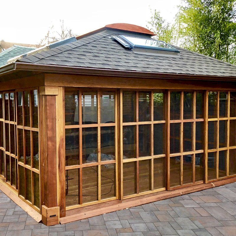 Sun Gazebo with Sliding Doors (Options: 16' L, 16' W, California Redwood, 4' x 8' Skylight, Complete Floor, Transparent Premium Sealant). Skylights and asphalt shingles by custom request. Photo Courtesy of S. Alishaev of New York, NY. Sun Gazebo with Sliding Doors (Options: 16' L, 16' W, California Redwood, 4' x 8' Skylight, Complete Floor, Transparent Premium Sealant). Skylights and asphalt shingles by custom request. Photo Courtesy of S. Alishaev of New York, NY.