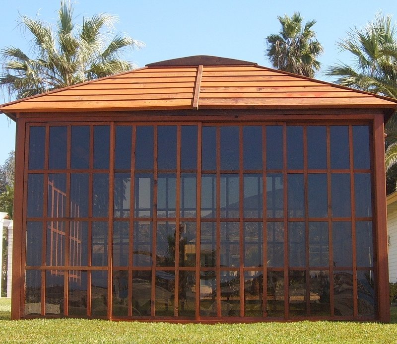 Sun Gazebo with Sliding Doors (Options: 12' L, 12' W, Mature Redwood, 4' x 8' Skylight, No Flooring, Transparent Premium Sealant). Photo Shows All Wall Panels Closed for Maximum Privacy. Sun Gazebo with Sliding Doors (Options: 12' L, 12' W, Mature Redwood, 4' x 8' Skylight, No Flooring, Transparent Premium Sealant). Photo Shows All Wall Panels Closed for Maximum Privacy.