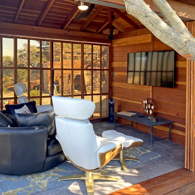 Sun Gazebo with Sliding Doors (Options: Custom Size 12' L x 10' W, California Redwood, 8 ft Wall Height, With One Solid Wall by Custom Request, Without Skylight, Complete Floor, with Metal Roof, Transparent Premium Sealant). Photo Courtesy of M. Locati of Lafayette, CA. Sun Gazebo with Sliding Doors (Options: Custom Size 12' L x 10' W, California Redwood, 8 ft Wall Height, With One Solid Wall by Custom Request, Without Skylight, Complete Floor, with Metal Roof, Transparent Premium Sealant). Photo Courtesy of M. Locati of Lafayette, CA.