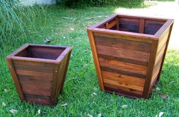 Tapered Planters (Options: 12" Square Base x 18" Square Top x 16.5"H and 18" Square Base x 24" Square Top x 26"H). Tapered Planters (Options: 12" Square Base x 18" Square Top x 16.5"H and 18" Square Base x 24" Square Top x 26"H).