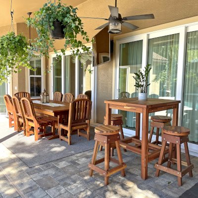 Custom Terrace Wood Cocktail Table (Options: 3' x 3' Square, Backless Wood Bar Stool, Redwood Mosaic, 42" H Table, Slatted Tabletop, Slightly Rounded Corners, with Swivel Seat, 28" H Seat, No Cushion, Transparent Premium Sealant). Photo Also Shows a Baja Table Set. Photo Courtesy of S. Boen of Palm Harbor, FL.