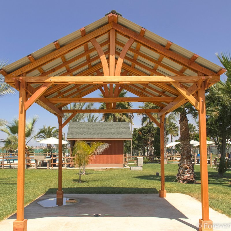 The Breezy Small Pavilion (Options: 14' L x 12' W, Douglas-fir, 4-Post Kit for Gale-Wind, No Ceiling Fan Base, Vertical Decorative Trims, Transparent Premium Sealant). The Breezy Small Pavilion (Options: 14' L x 12' W, Douglas-fir, 4-Post Kit for Gale-Wind, No Ceiling Fan Base, Vertical Decorative Trims, Transparent Premium Sealant).