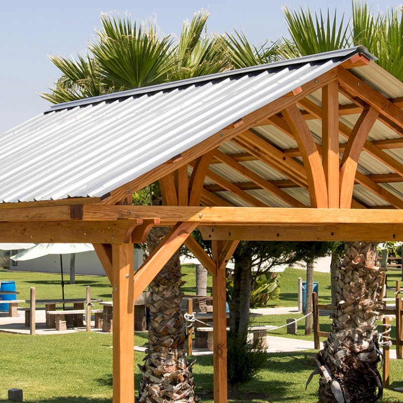 The Breezy Small Pavilion (Options: 14' L x 12' W, Douglas-fir, 4-Post Kit for Gale-Wind, No Ceiling Fan Base, Vertical Decorative Trims, Transparent Premium Sealant). The Breezy Small Pavilion (Options: 14' L x 12' W, Douglas-fir, 4-Post Kit for Gale-Wind, No Ceiling Fan Base, Vertical Decorative Trims, Transparent Premium Sealant).