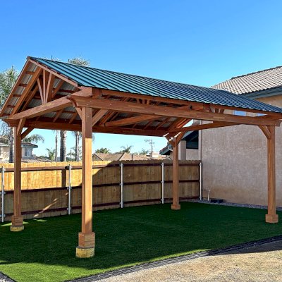 The Breezy Pavilion (Options: 20' L x 15' W, Mosaic Douglas-Fir, 4-Post Anchor Kit for Concrete, No Ceiling Fan Base, No Post Decorative Trims, Transparent Premium Sealant). Photo Courtesy of B. Worley of Ramona, CA.