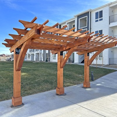 The Cantilevered Pergola (Options: 8in x 8in Post Thickness, 15' Length x 8' Width, California Redwood, 7 ft Posts Height, 3-Post High-Wnd Anchor Kit, Transparent Premium Sealant). Photo Courtesy of R. Pike of Denver, CO.