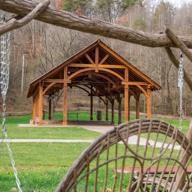 The Cardinal's Nest Pavilions (Options: 60’ L x 34’ W, California Redwood, 16-Post Anchor Kit for Hurricane Anchors will be at least 24" x 24" x 36", Electrical Wiring Trim Kit for 6 Posts, and 6 Cutouts for Outlets, 2 Ceiling Fan Bases and at least 4 cutouts for Electrical Boxes, Transparent Premium Sealant), Photo Courtesy of S. Hilton of Sevierville, TN. The Cardinal's Nest Pavilions (Options: 60’ L x 34’ W, California Redwood, 16-Post Anchor Kit for Hurricane Anchors will be at least 24" x 24" x 36", Electrical Wiring Trim Kit for 6 Posts, and 6 Cutouts for Outlets, 2 Ceiling Fan Bases and at least 4 cutouts for Electrical Boxes, Transparent Premium Sealant), Photo Courtesy of S. Hilton of Sevierville, TN.