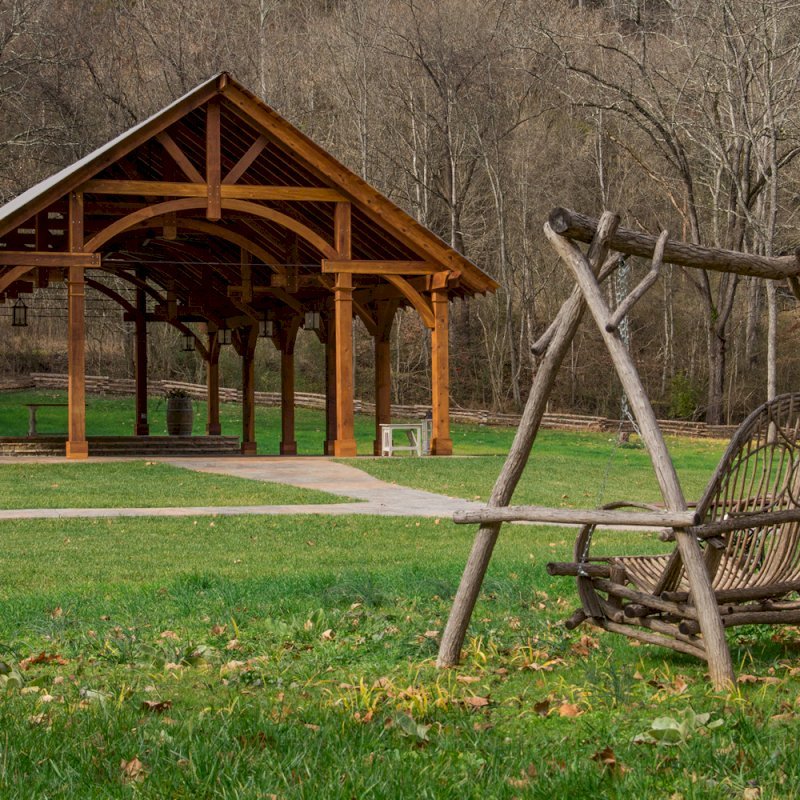 The Cardinal's Nest Pavilions (Options: 60’ L x 34’ W, California Redwood, 16-Post Anchor Kit for Hurricane Anchors will be at least 24" x 24" x 36", Electrical Wiring Trim Kit for 6 Posts, and 6 Cutouts for Outlets, 2 Ceiling Fan Bases and at least 4 cutouts for Electrical Boxes, Transparent Premium Sealant), Photo Courtesy of S. Hilton of Sevierville, TN. The Cardinal's Nest Pavilions (Options: 60’ L x 34’ W, California Redwood, 16-Post Anchor Kit for Hurricane Anchors will be at least 24" x 24" x 36", Electrical Wiring Trim Kit for 6 Posts, and 6 Cutouts for Outlets, 2 Ceiling Fan Bases and at least 4 cutouts for Electrical Boxes, Transparent Premium Sealant), Photo Courtesy of S. Hilton of Sevierville, TN.
