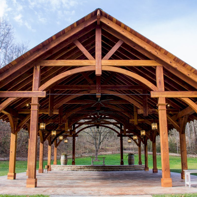 The Cardinal's Nest Pavilions (Options: 60’ L x 34’ W, California Redwood, 16-Post Anchor Kit for Hurricane Anchors will be at least 24" x 24" x 36", Electrical Wiring Trim Kit for 6 Posts, and 6 Cutouts for Outlets, 2 Ceiling Fan Bases and at least 4 cutouts for Electrical Boxes, Transparent Premium Sealant), Photo Courtesy of S. Hilton of Sevierville, TN. The Cardinal's Nest Pavilions (Options: 60’ L x 34’ W, California Redwood, 16-Post Anchor Kit for Hurricane Anchors will be at least 24" x 24" x 36", Electrical Wiring Trim Kit for 6 Posts, and 6 Cutouts for Outlets, 2 Ceiling Fan Bases and at least 4 cutouts for Electrical Boxes, Transparent Premium Sealant), Photo Courtesy of S. Hilton of Sevierville, TN.