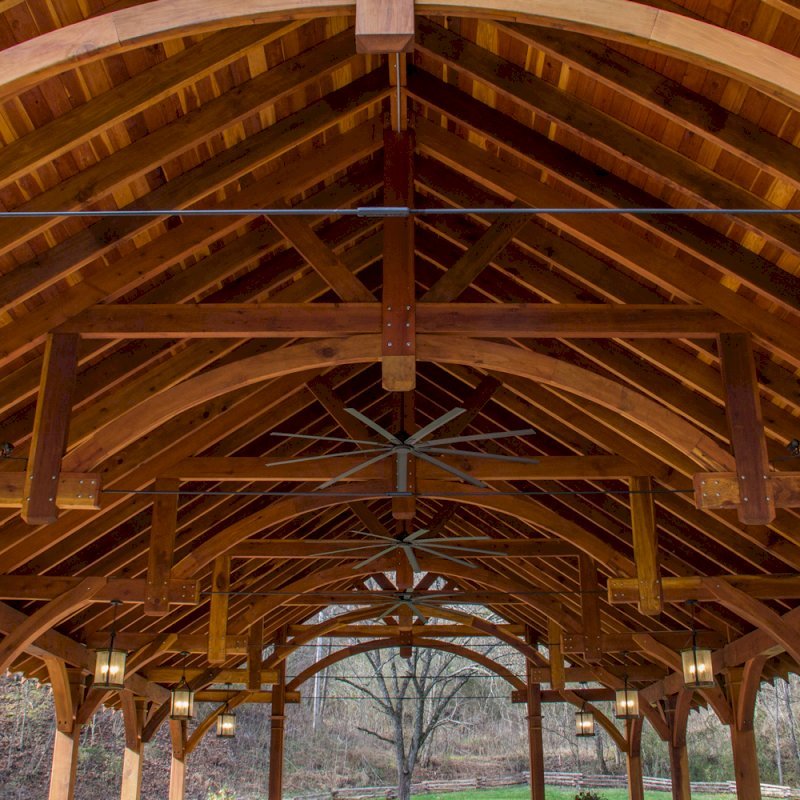 The Cardinals Nest Pavilions (Options: 60’ L x 34’ W, California Redwood, 16-Post Anchor Kit for Hurricane Anchors will be at least 24" x 24" x 36", Electrical Wiring Trim Kit for 6 Posts, and 6 Cutouts for Outlets, 2 Ceiling Fan Bases and at least 4 cutouts for Electrical Boxes, Transparent Premium Sealant), Photo Courtesy of S. Hilton of Sevierville, TN. The Cardinals Nest Pavilions (Options: 60’ L x 34’ W, California Redwood, 16-Post Anchor Kit for Hurricane Anchors will be at least 24" x 24" x 36", Electrical Wiring Trim Kit for 6 Posts, and 6 Cutouts for Outlets, 2 Ceiling Fan Bases and at least 4 cutouts for Electrical Boxes, Transparent Premium Sealant), Photo Courtesy of S. Hilton of Sevierville, TN.