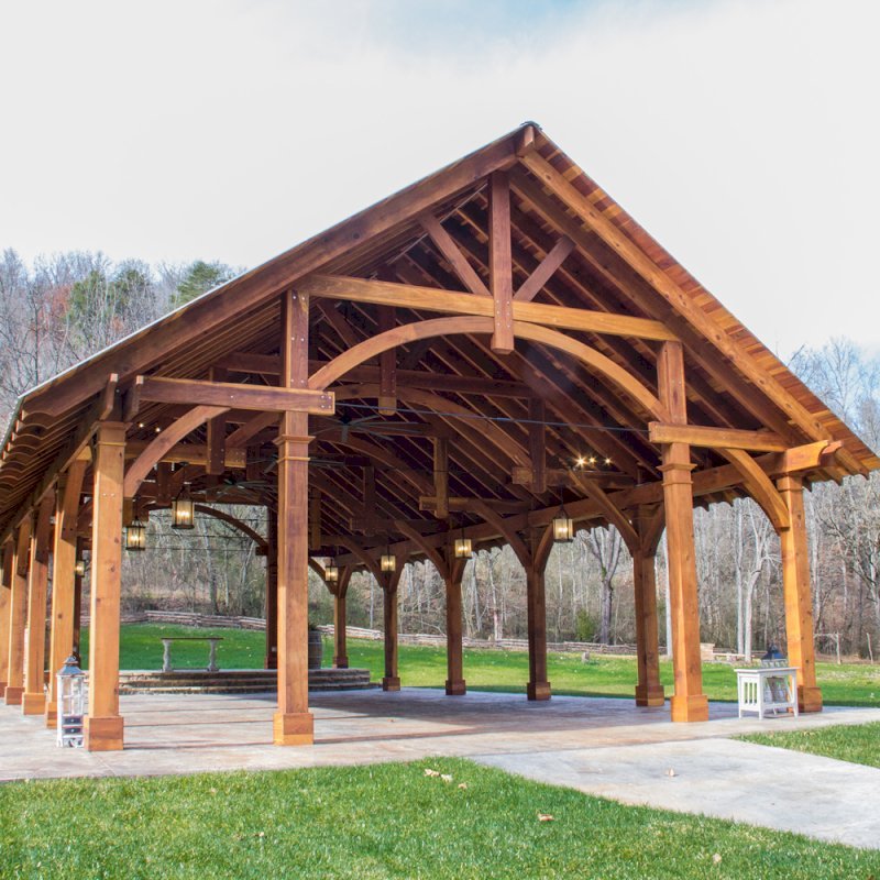 The Cardinals Nest Pavilions (Options: 60’ L x 34’ W, California Redwood, 16-Post Anchor Kit for Hurricane Anchors will be at least 24" x 24" x 36", Electrical Wiring Trim Kit for 6 Posts, and 6 Cutouts for Outlets, 2 Ceiling Fan Bases and at least 4 cutouts for Electrical Boxes, Transparent Premium Sealant), Photo Courtesy of S. Hilton of Sevierville, TN. The Cardinals Nest Pavilions (Options: 60’ L x 34’ W, California Redwood, 16-Post Anchor Kit for Hurricane Anchors will be at least 24" x 24" x 36", Electrical Wiring Trim Kit for 6 Posts, and 6 Cutouts for Outlets, 2 Ceiling Fan Bases and at least 4 cutouts for Electrical Boxes, Transparent Premium Sealant), Photo Courtesy of S. Hilton of Sevierville, TN.