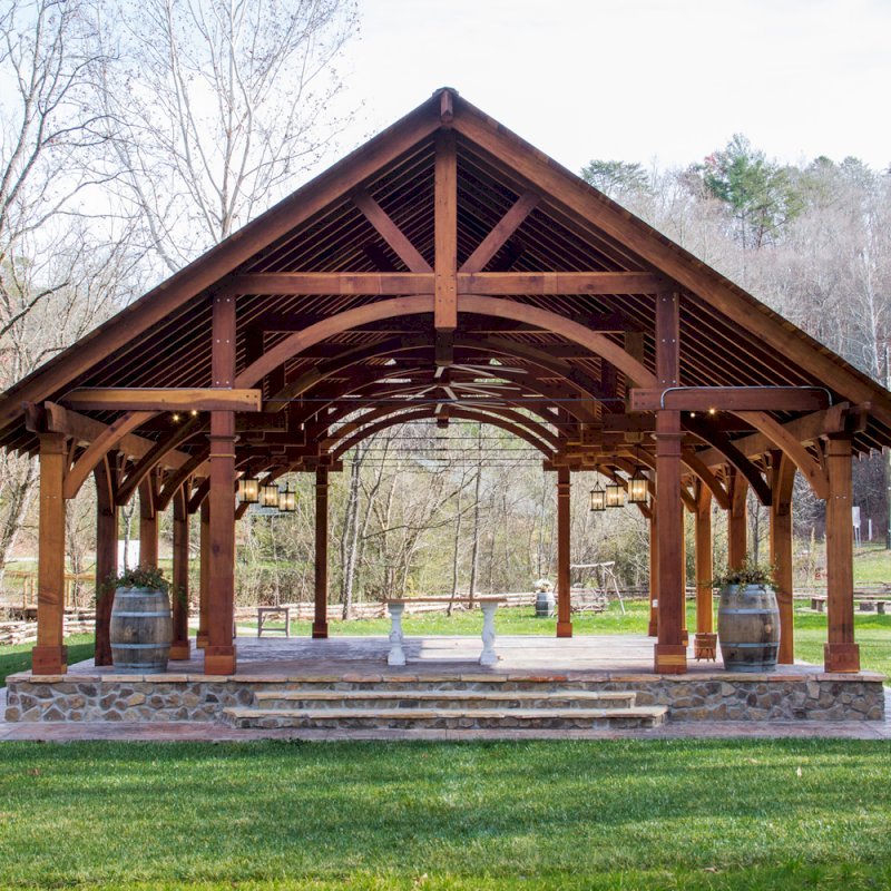 The Cardinal's Nest Pavilions (Options: 60’ L x 34’ W, California Redwood, 16-Post Anchor Kit for Hurricane Anchors will be at least 24" x 24" x 36", Electrical Wiring Trim Kit for 6 Posts, and 6 Cutouts for Outlets, 2 Ceiling Fan Bases and at least 4 cutouts for Electrical Boxes, Transparent Premium Sealant), Photo Courtesy of S. Hilton of Sevierville, TN. The Cardinal's Nest Pavilions (Options: 60’ L x 34’ W, California Redwood, 16-Post Anchor Kit for Hurricane Anchors will be at least 24" x 24" x 36", Electrical Wiring Trim Kit for 6 Posts, and 6 Cutouts for Outlets, 2 Ceiling Fan Bases and at least 4 cutouts for Electrical Boxes, Transparent Premium Sealant), Photo Courtesy of S. Hilton of Sevierville, TN.