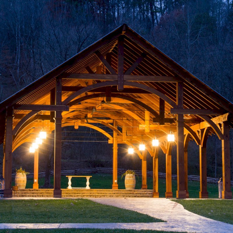 The Cardinal's Nest Pavilions (Options: 60’ L x 34’ W, California Redwood, 16-Post Anchor Kit for Hurricane Anchors will be at least 24" x 24" x 36", Electrical Wiring Trim Kit for 6 Posts, and 6 Cutouts for Outlets, 2 Ceiling Fan Bases and at least 4 cutouts for Electrical Boxes, Transparent Premium Sealant), Photo Courtesy of S. Hilton of Sevierville, TN. The Cardinal's Nest Pavilions (Options: 60’ L x 34’ W, California Redwood, 16-Post Anchor Kit for Hurricane Anchors will be at least 24" x 24" x 36", Electrical Wiring Trim Kit for 6 Posts, and 6 Cutouts for Outlets, 2 Ceiling Fan Bases and at least 4 cutouts for Electrical Boxes, Transparent Premium Sealant), Photo Courtesy of S. Hilton of Sevierville, TN.