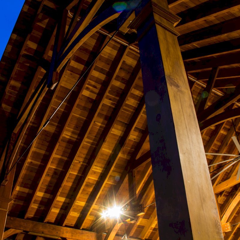 The Cardinals Nest Pavilions (Options: 60’ L x 34’ W, California Redwood, 16-Post Anchor Kit for Hurricane Anchors will be at least 24" x 24" x 36", Electrical Wiring Trim Kit for 6 Posts, and 6 Cutouts for Outlets, 2 Ceiling Fan Bases and at least 4 cutouts for Electrical Boxes, Transparent Premium Sealant), Photo Courtesy of S. Hilton of Sevierville, TN. The Cardinals Nest Pavilions (Options: 60’ L x 34’ W, California Redwood, 16-Post Anchor Kit for Hurricane Anchors will be at least 24" x 24" x 36", Electrical Wiring Trim Kit for 6 Posts, and 6 Cutouts for Outlets, 2 Ceiling Fan Bases and at least 4 cutouts for Electrical Boxes, Transparent Premium Sealant), Photo Courtesy of S. Hilton of Sevierville, TN.