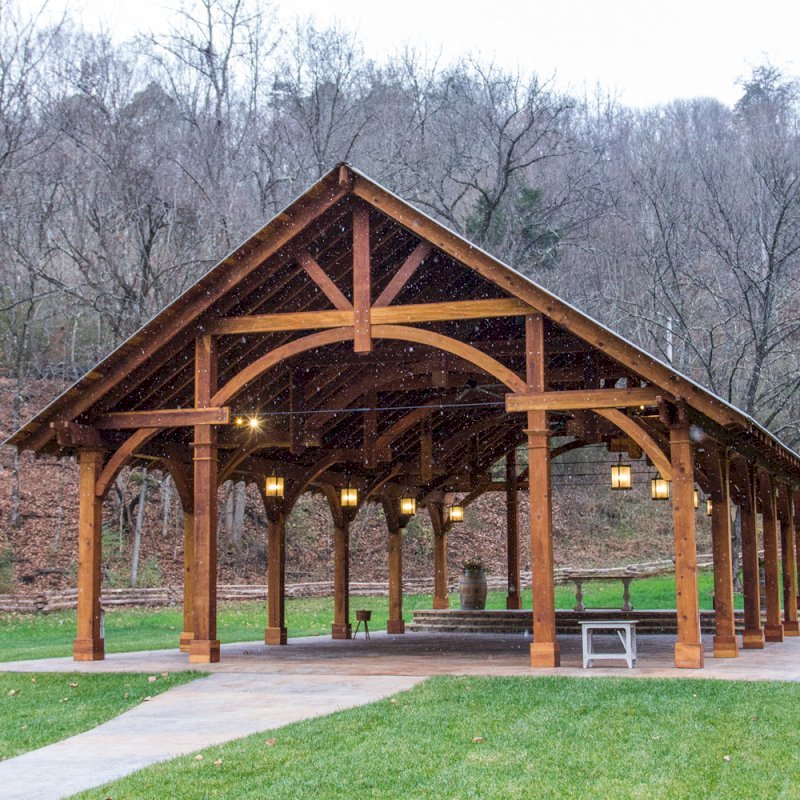 The Cardinal's Nest Pavilions (Options: 60’ L x 34’ W, California Redwood, 16-Post Anchor Kit for Hurricane Anchors will be at least 24" x 24" x 36", Electrical Wiring Trim Kit for 6 Posts, and 6 Cutouts for Outlets, 2 Ceiling Fan Bases and at least 4 cutouts for Electrical Boxes, Transparent Premium Sealant), Photo Courtesy of S. Hilton of Sevierville, TN. The Cardinal's Nest Pavilions (Options: 60’ L x 34’ W, California Redwood, 16-Post Anchor Kit for Hurricane Anchors will be at least 24" x 24" x 36", Electrical Wiring Trim Kit for 6 Posts, and 6 Cutouts for Outlets, 2 Ceiling Fan Bases and at least 4 cutouts for Electrical Boxes, Transparent Premium Sealant), Photo Courtesy of S. Hilton of Sevierville, TN.