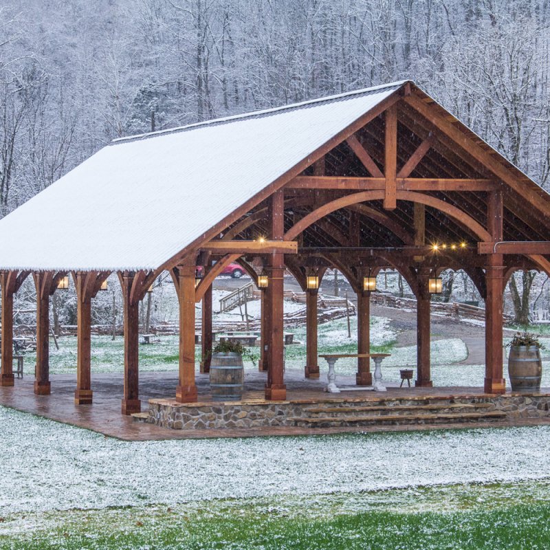 The Cardinal's Nest Pavilions (Options: 60’ L x 34’ W, California Redwood, 16-Post Anchor Kit for Hurricane Anchors will be at least 24" x 24" x 36", Electrical Wiring Trim Kit for 6 Posts, and 6 Cutouts for Outlets, 2 Ceiling Fan Bases and at least 4 cutouts for Electrical Boxes, Transparent Premium Sealant), Photo Courtesy of S. Hilton of Sevierville, TN. The Cardinal's Nest Pavilions (Options: 60’ L x 34’ W, California Redwood, 16-Post Anchor Kit for Hurricane Anchors will be at least 24" x 24" x 36", Electrical Wiring Trim Kit for 6 Posts, and 6 Cutouts for Outlets, 2 Ceiling Fan Bases and at least 4 cutouts for Electrical Boxes, Transparent Premium Sealant), Photo Courtesy of S. Hilton of Sevierville, TN.