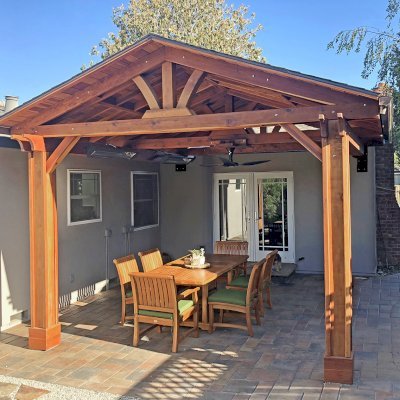 The Del Norte Porch Pavilion (Options: 14' L x 16' W, California Redwood, 2-Post Anchor Kit for High-Wind, 1 Ceiling Fan Base, 1 Electrical Wiring Trim Kit, Vertical Post Decorative Trims, Transparent Premium Sealant).