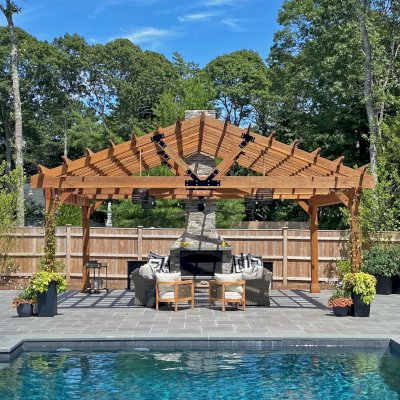 The Gable Pergola (Options: 24' L x 20' W, No Wall Privacy Panel, California Redwood, No Fascia Board for Gutters, 10ft Post Height, 3 Electrical Wiring Trim Kit, No Post Decorative Trims, 6-Post Kit for High-Wind, 1 Ceiling Fan Base, No Curtain Rods, Transparent Premium Sealant). Photo Courtesy of J. Jonsson of Osterville, MA.
