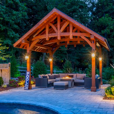 The Granada Pavilion (Options: 8in x 8in Posts, 18 ft x 18 ft, Douglas-fir, 4-Post Anchor Kit for High-Wind, with Fascia Board, No Curtain Rods, 1 Ceiling Fan Base, Coffee-Stain Premium Sealant). Photo Courtesy of J. Benedetto of Montville, NJ.