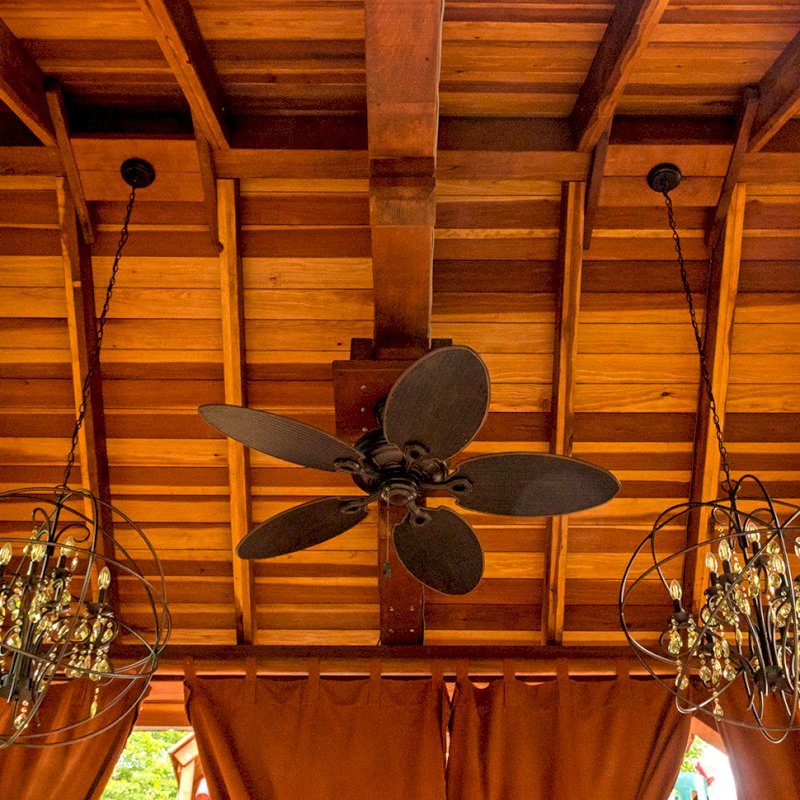 The Granada Pavilion (Options: 6in x 6in post thickness, 18' L x 15' W, No Privacy Panels, California Redwood with a 15-year warranty, No Fascia Board for Gutters, 10.5ft Post Height, 1 Electrical Wiring Trim, No Post Decorative Trim, 4-post Anchor Kit for Gale-Wind, 3 Ceiling Fan Bases (CUSTOM REQUEST), 4 Heavy Duty Curtain Rods & Stainless Steel Hangars, Transparent Premium Sealant). Photo Courtesy of J. Rynerson of Franklin, Tennessee. The Granada Pavilion (Options: 6in x 6in post thickness, 18' L x 15' W, No Privacy Panels, California Redwood with a 15-year warranty, No Fascia Board for Gutters, 10.5ft Post Height, 1 Electrical Wiring Trim, No Post Decorative Trim, 4-post Anchor Kit for Gale-Wind, 3 Ceiling Fan Bases (CUSTOM REQUEST), 4 Heavy Duty Curtain Rods & Stainless Steel Hangars, Transparent Premium Sealant). Photo Courtesy of J. Rynerson of Franklin, Tennessee.
