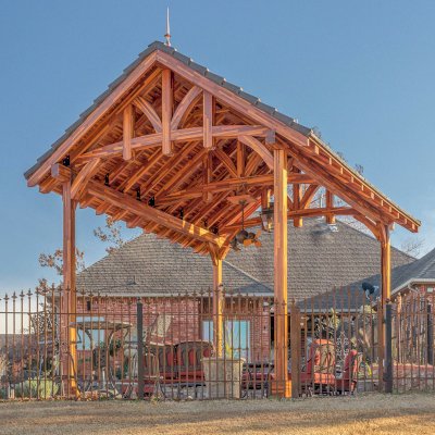 Custom Granada Pavilion (Options: 20 ft x 15 ft, Mosaic Redwood, 4-Post Anchor Kit for High-Wind, No Fascia Board, No Curtain Rods, 3 Ceiling Fan Bases, Transparent Premium Sealant). Shake from DaVinci Roof [https://www.davinciroofscapes.com/]. Photo Courtesy of K. Lowe of Newcastle, Oklahoma.