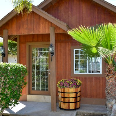 The Half Barrel Planters (Options: California Redwood, Interior and Exterior of Box with Sealant [No Growing Vegetables], Transparent Premium Sealant). 