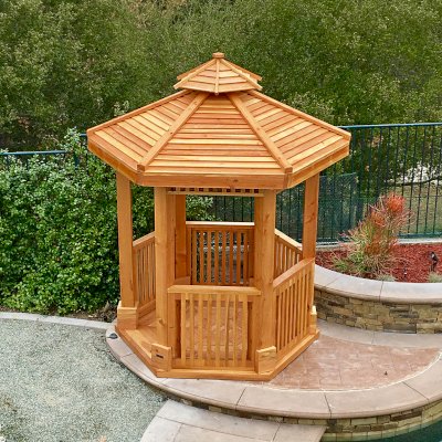 The Hexagonal Retreat Pavilion (Options: Custom 7.5' Diameter, Add a Deck, Douglas-fir, 7' H Posts, 6-Post Anchor Kit for Concrete, With Upper and Lower Panels, Transparent Premium Sealant). Photo Courtesy of P. Redmond of Coto De Caza, CA. 