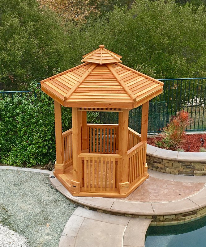 The Hexagonal Retreat Pavilion (Options: Custom 7.5' Diameter, Add a Deck, Douglas-fir, 7' H Posts, 6-Post Kit for Concrete, With Upper and Lower Panels, Transparent Premium Sealant). Photo Courtesy of P. Redmond of Coto De Caza, CA. The Hexagonal Retreat Pavilion (Options: Custom 7.5' Diameter, Add a Deck, Douglas-fir, 7' H Posts, 6-Post Kit for Concrete, With Upper and Lower Panels, Transparent Premium Sealant). Photo Courtesy of P. Redmond of Coto De Caza, CA.