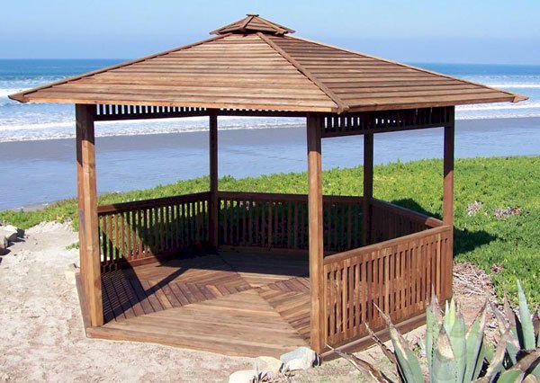 The Hexagonal Retreat Pavilion (Options: 14' Diameter, Add a Deck, Mature Redwood, With Upper and Lower Panels, Transparent Premium Sealant). The Hexagonal Retreat Pavilion (Options: 14' Diameter, Add a Deck, Mature Redwood, With Upper and Lower Panels, Transparent Premium Sealant).