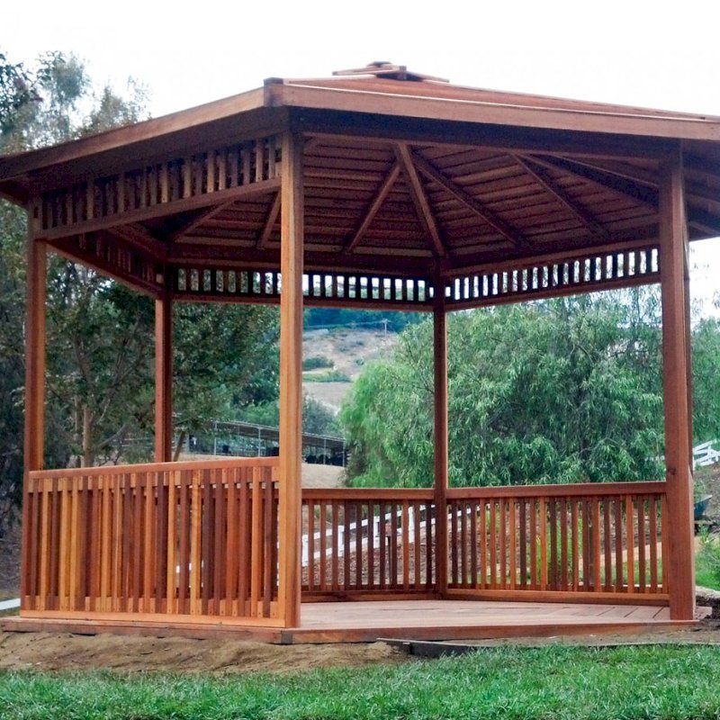 The Hexagonal Retreat Pavilion (Options: 14' Diameter, Add a Deck, California Redwood, With Upper and Lower Panels, Transparent Premium Sealant). The Hexagonal Retreat Pavilion (Options: 14' Diameter, Add a Deck, California Redwood, With Upper and Lower Panels, Transparent Premium Sealant).