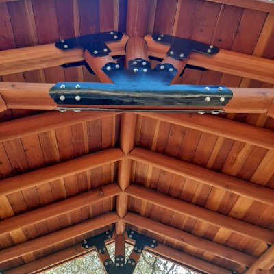 Humboldt Log Pavilion (Options: 6in x 6in Posts Thickness, 12ft L x 12ft W, No Privacy Panels, California Redwood, 2 Fascia Boards for Gutters, 9.5ft Post Height, No Electrical Wiring Trim, 4-Post Anchor Kit for High-Wind, No Ceiling Fan Fan Bases, No Curtain Rods, Transparent Premium Sealant). Metal Roof Installed by Custom Request.