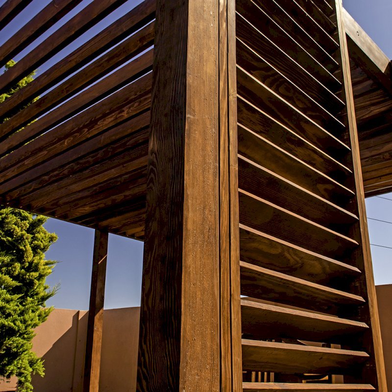 The L.A. Modern Pergola (options: 16' L, 14' W, Douglas-fir, No Rain Guard, 10 ft Post Height, No Electrical Wiring Trim, 4 Post Anchor Kit for Gale-Wind, No Ceiling Fan Base, No Retractable Shade Canopy, Cherry Stain Premium Sealant). The L.A. Modern Pergola (options: 16' L, 14' W, Douglas-fir, No Rain Guard, 10 ft Post Height, No Electrical Wiring Trim, 4 Post Anchor Kit for Gale-Wind, No Ceiling Fan Base, No Retractable Shade Canopy, Cherry Stain Premium Sealant).