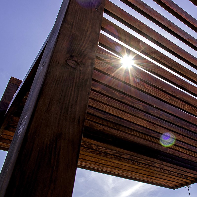 The L.A. Modern Pergola (options: 16' L, 14' W, Douglas-fir, No Rain Guard, 10 ft Post Height, No Electrical Wiring Trim, 4 Post Anchor Kit for Gale-Wind, No Ceiling Fan Base, No Retractable Shade Canopy, Cherry Stain Premium Sealant). The L.A. Modern Pergola (options: 16' L, 14' W, Douglas-fir, No Rain Guard, 10 ft Post Height, No Electrical Wiring Trim, 4 Post Anchor Kit for Gale-Wind, No Ceiling Fan Base, No Retractable Shade Canopy, Cherry Stain Premium Sealant).