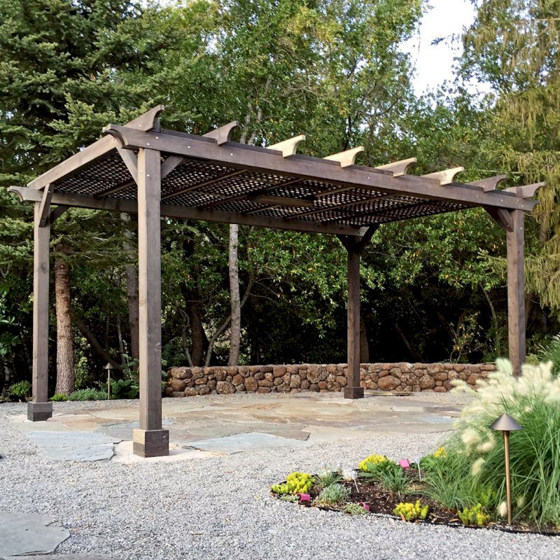 The Lattice Pergola Kit (Options: 18' L x 12' W, California Redwood, No Electrical Wiring Trim, Lattice Roof, Lengthwise Roof Support Timbers, 4-Post Kit for Stone, Brick, or Concrete, 1 Ceiling Fan Base, No Privacy Panels, No Curtain Rods, 9' Post Height, Eco Wood Treatment). Photo Courtesy of B. Savard of San Rafael, California. The Lattice Pergola Kit (Options: 18' L x 12' W, California Redwood, No Electrical Wiring Trim, Lattice Roof, Lengthwise Roof Support Timbers, 4-Post Kit for Stone, Brick, or Concrete, 1 Ceiling Fan Base, No Privacy Panels, No Curtain Rods, 9' Post Height, Eco Wood Treatment). Photo Courtesy of B. Savard of San Rafael, California.