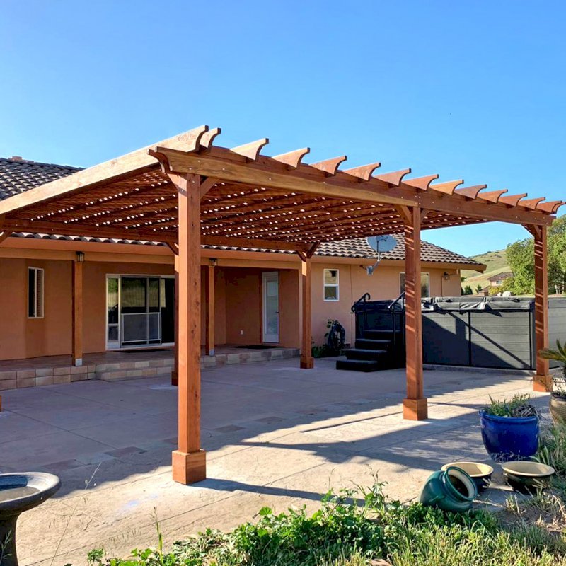 The Lattice Pergola Kit (Options: 24' L x 20' W, California Redwood, No Electrical Wiring Trim, Lattice Roof, Lengthwise Roof Support Timbers, 6-Post Anchor Kit for Concrete, No ceiling Fan Base, No Privacy Panels, No Curtains Rods, 9.5' Post Height, Transparent Premium Sealant). Photo Courtesy of C. Lopez of Salinas, CA. The Lattice Pergola Kit (Options: 24' L x 20' W, California Redwood, No Electrical Wiring Trim, Lattice Roof, Lengthwise Roof Support Timbers, 6-Post Anchor Kit for Concrete, No ceiling Fan Base, No Privacy Panels, No Curtains Rods, 9.5' Post Height, Transparent Premium Sealant). Photo Courtesy of C. Lopez of Salinas, CA.