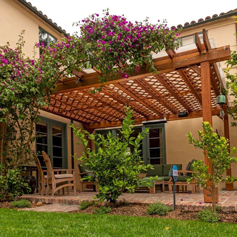 Custom The Lattice Pergola Kit (Options: 19' L x 16' W, California Redwood, Electrical Wiring Trim for 2 Posts, Lattice Roof, 4-Post Kit for Concrete, No Ceiling Fan Base, No Privacy Panels, No Curtain Rods, 9' Post Height, Transparent Premium Sealant). Lattice panels were customized with larger openings than is the standard design. Photo Courtesy of D. Wood of Palo Alto, California. Custom The Lattice Pergola Kit (Options: 19' L x 16' W, California Redwood, Electrical Wiring Trim for 2 Posts, Lattice Roof, 4-Post Kit for Concrete, No Ceiling Fan Base, No Privacy Panels, No Curtain Rods, 9' Post Height, Transparent Premium Sealant). Lattice panels were customized with larger openings than is the standard design. Photo Courtesy of D. Wood of Palo Alto, California.