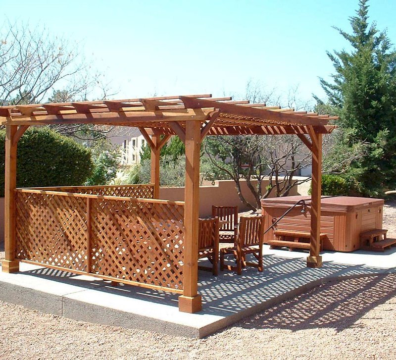 The Lattice Pergola Kit (Options: 15' x 15', California Redwood, No Electrical Wiring Trim, Lattice Panel Roof, 4-post Anchor Kit for Stone, No Ceiling Fan Base, 2 Privacy Panels, No Curtain Rods, 9' Post Height, Transparent Premium Sealant). Under the Pergola, a 7' San Francisco Patio Table Set with 42" W Tabletop, 4 Ruth Chairs and 2 Ruth Armchairs. Photo Courtesy of Mr. Joseph Dlugosz of Sedona, AZ. The Lattice Pergola Kit (Options: 15' x 15', California Redwood, No Electrical Wiring Trim, Lattice Panel Roof, 4-post Anchor Kit for Stone, No Ceiling Fan Base, 2 Privacy Panels, No Curtain Rods, 9' Post Height, Transparent Premium Sealant). Under the Pergola, a 7' San Francisco Patio Table Set with 42" W Tabletop, 4 Ruth Chairs and 2 Ruth Armchairs. Photo Courtesy of Mr. Joseph Dlugosz of Sedona, AZ.