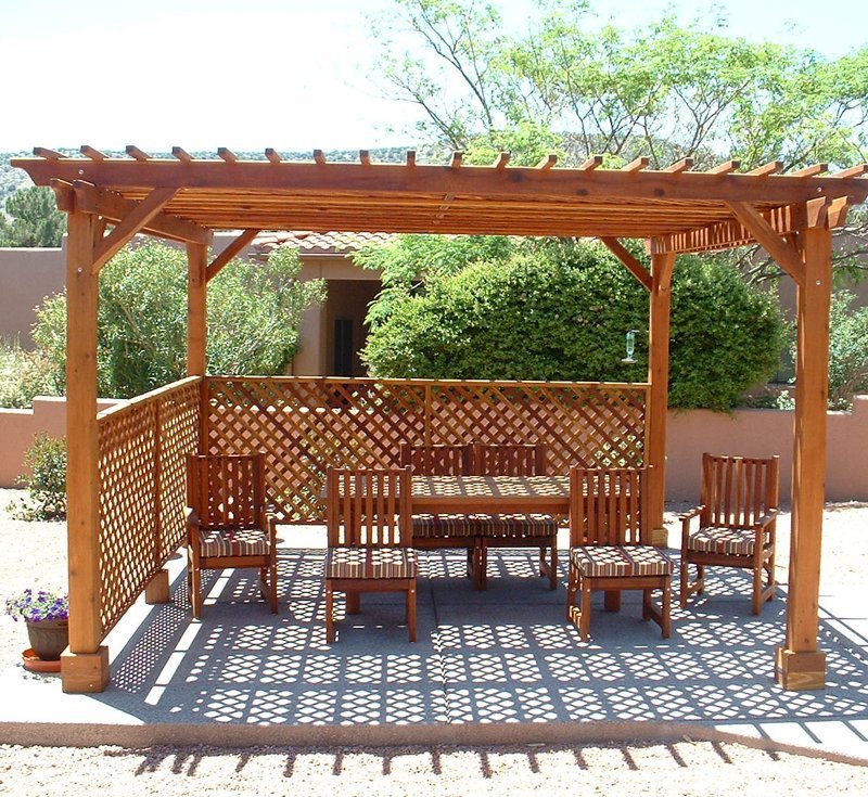 The Lattice Pergola Kit (Options: 15' x 15', California Redwood, No Electrical Wiring Trim, Lattice Panel Roof, 4-post Anchor Kit for Stone, No Ceiling Fan Base, 2 Privacy Panels, No Curtain Rods, 9' Post Height, Transparent Premium Sealant). Under the Pergola, a 7' San Francisco Patio Table Set with 42" W Tabletop, 4 Ruth Chairs and 2 Ruth Armchairs. Photo Courtesy of Mr. Joseph Dlugosz of Sedona, AZ. The Lattice Pergola Kit (Options: 15' x 15', California Redwood, No Electrical Wiring Trim, Lattice Panel Roof, 4-post Anchor Kit for Stone, No Ceiling Fan Base, 2 Privacy Panels, No Curtain Rods, 9' Post Height, Transparent Premium Sealant). Under the Pergola, a 7' San Francisco Patio Table Set with 42" W Tabletop, 4 Ruth Chairs and 2 Ruth Armchairs. Photo Courtesy of Mr. Joseph Dlugosz of Sedona, AZ.
