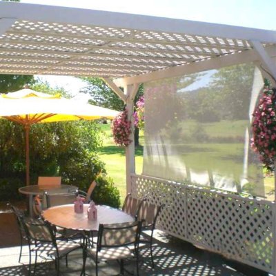 Lattice Pergola Kit (Options:14' x 16', Douglas-fir, No Electrical Wiring Trim, Lengthwise Roof Support, 4-Post Anchor Kit for Concrete, No Ceiling Fan Base, 1 Privacy Panel, No Curtain Rods, 9' Post Height, Off-White Oil-Based Primer). Custom sail clothe made with Sunbrella fabric. Custom request: no roof slats included.