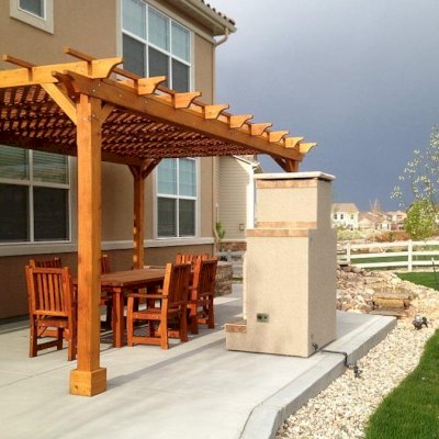 Lattice Pergola Kit (Options: 20' L x 12' W, Mature Redwood, No Electrical Wiring Trim, Lengthwise Roof Support Timbers, 4-Post Anchor Kit for Concrete, No Ceiling Fan Base, No Privacy Panels, No Curtain Rods, 9.5' Post Height, Transparent Premium Sealant). 2x2 Slats Above Rafters was Added as Custom Detail. It is not Part of Standard Design. 