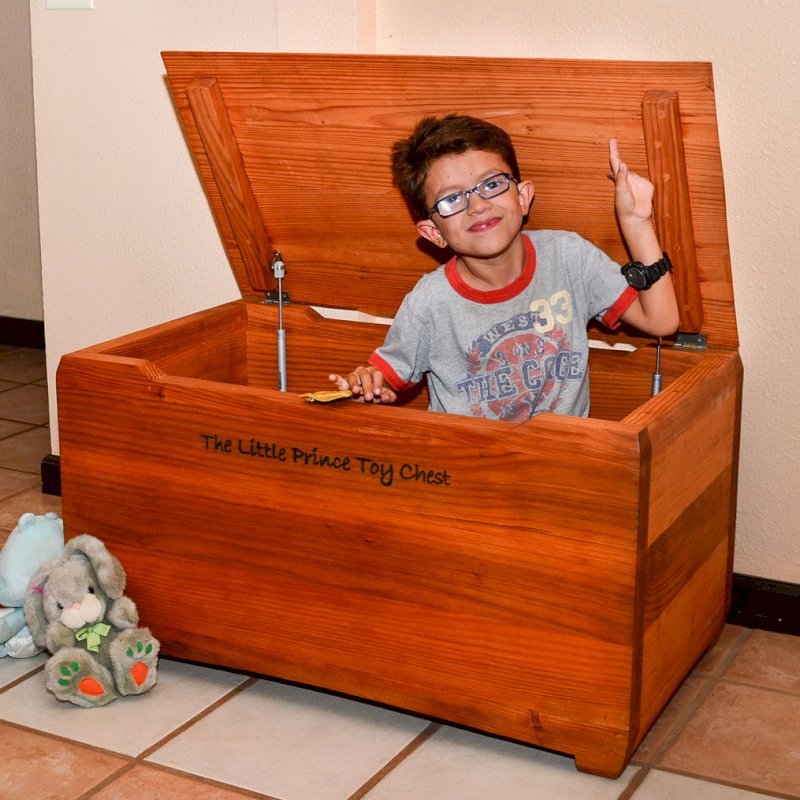 The Little Prince Toy Chest (Options: Mature Redwood, Custom Engraving, Transparent Premium Sealant). The Little Prince Toy Chest (Options: Mature Redwood, Custom Engraving, Transparent Premium Sealant).
